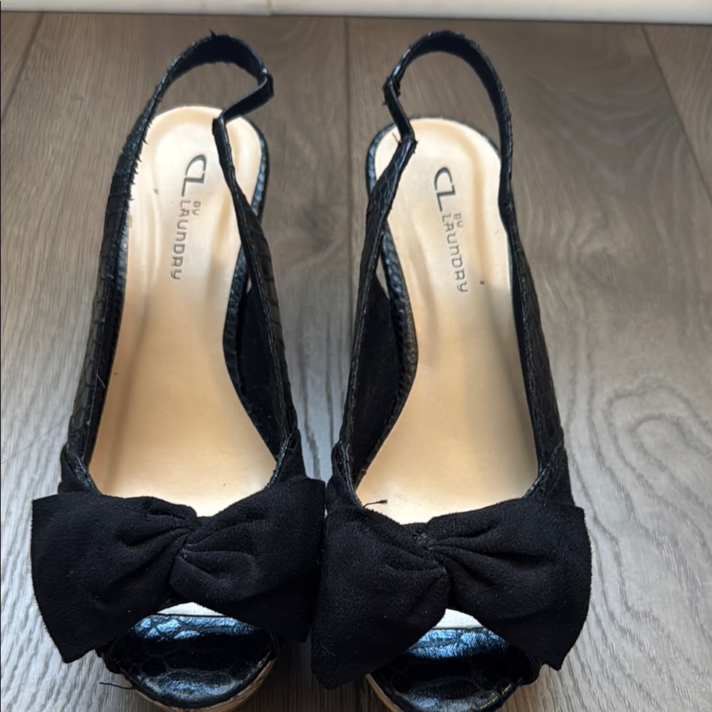 Elegant Black Slingback Heels with Open Toe and Decorative Bow